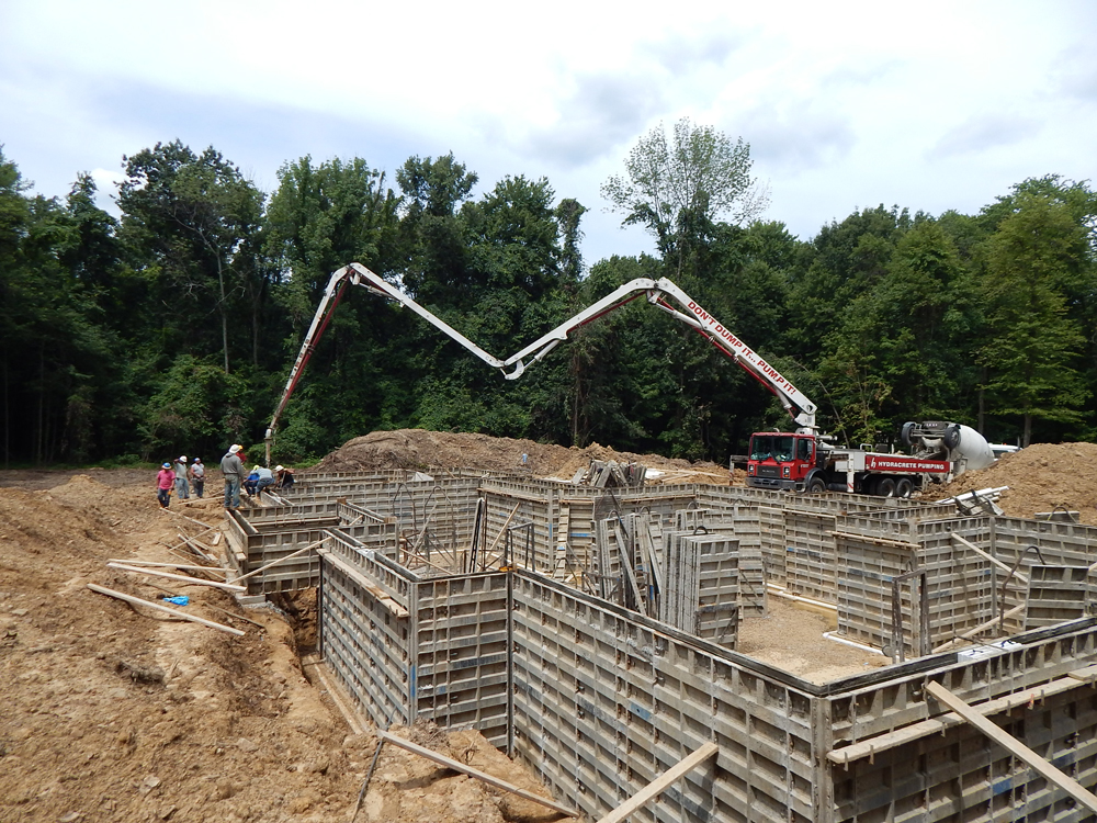foundation walls being set in place